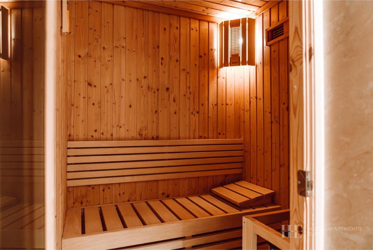 He Hotel Apartments Dubai Exterior foto A Finnish sauna